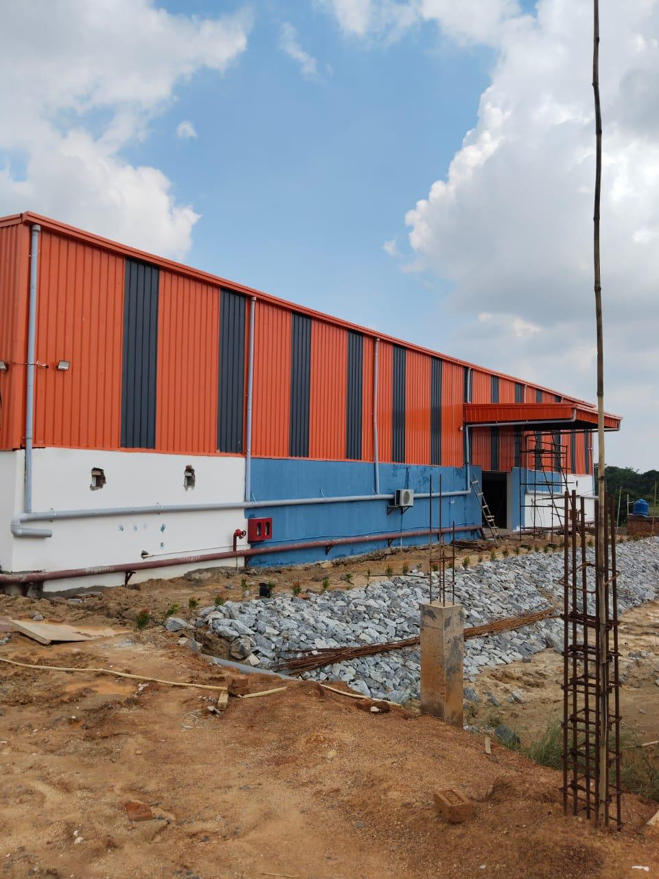 Ranchi factory exterior with cladding and external services during execution