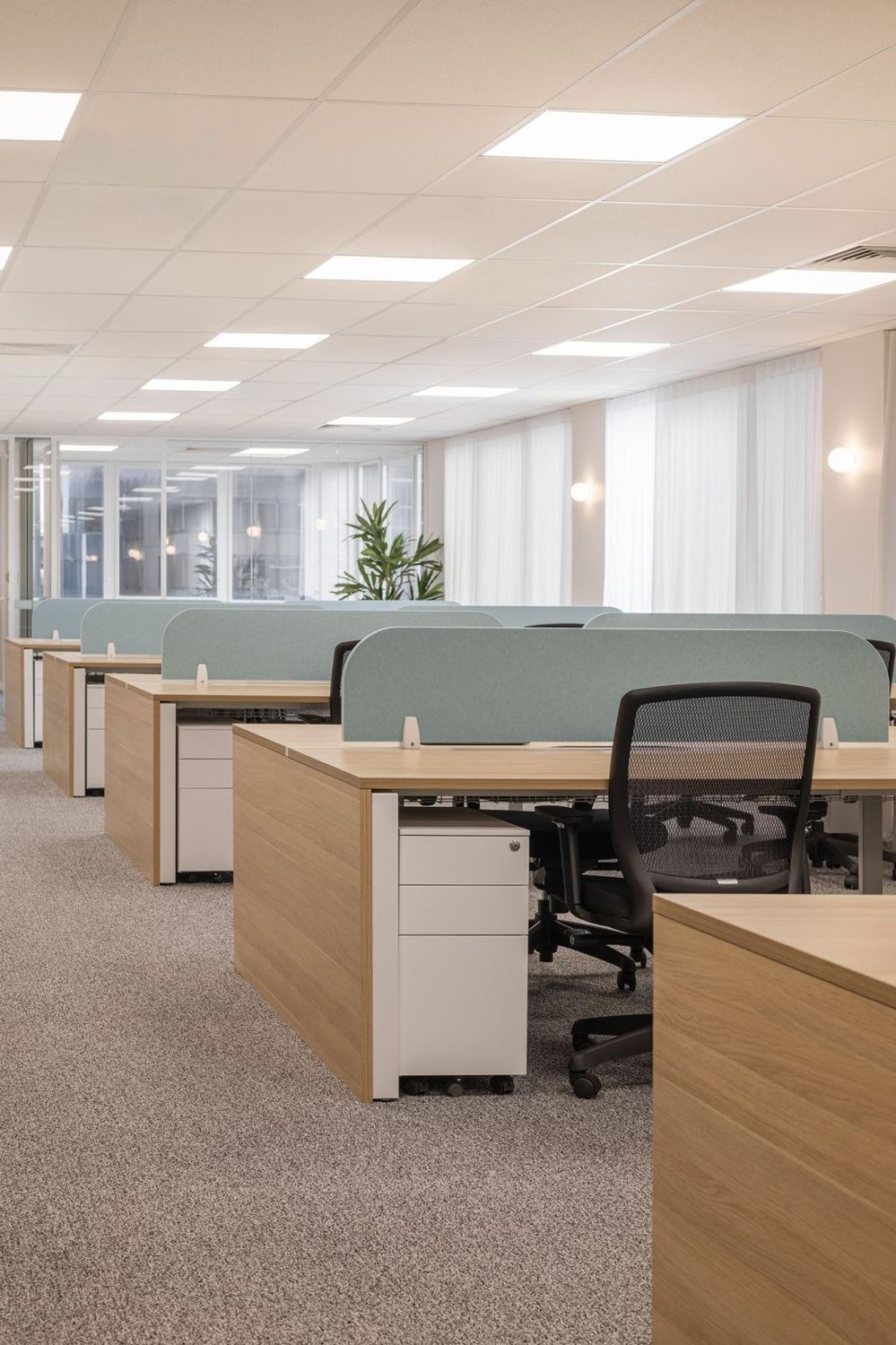 Completed workstation area at the 4,000 sq ft Saarthee Technology office in Gurugram